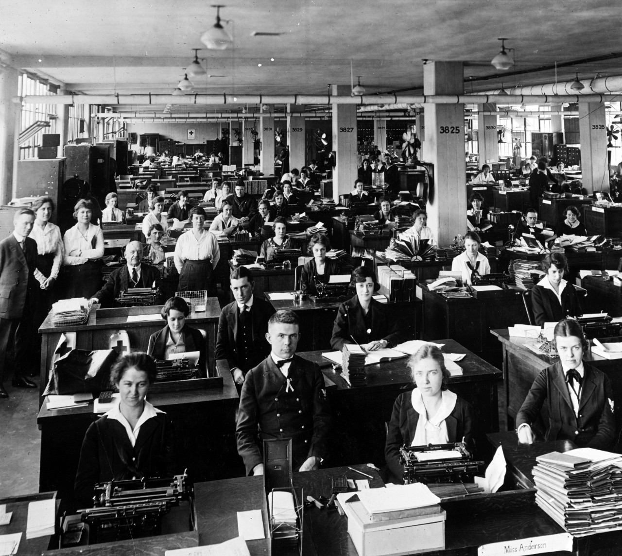 Hundreds of clerks at typewriters in a large office hall, 1918